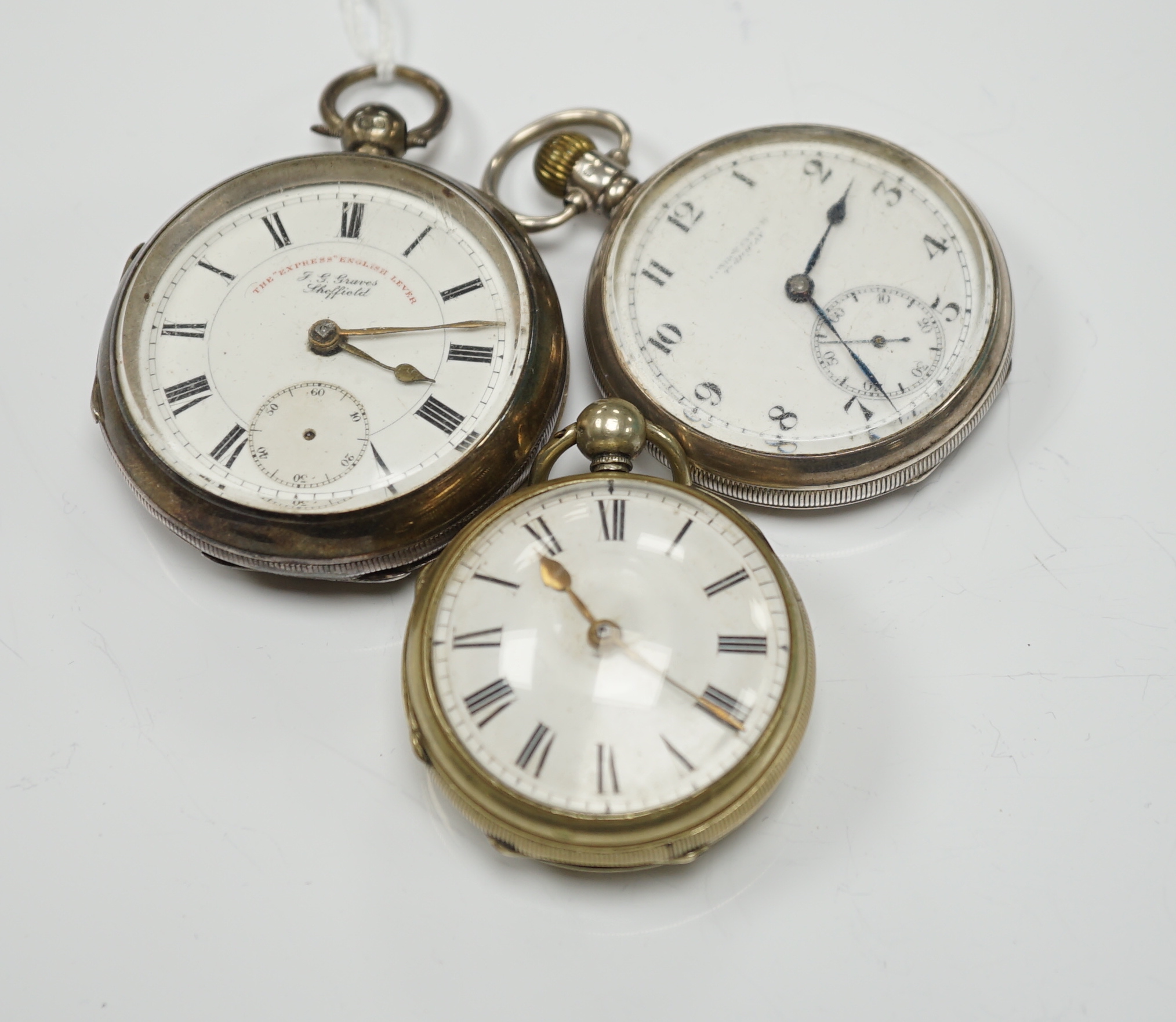 A Georgian gilt metal pair cased pocket watch (lacking outer case) by Masters of Piccadilly, with Roman dial, together with two early 20th century silver open face pocket watches including 'Express English Lever'.